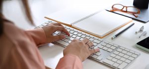 Hands Typing Laptop Notebook.